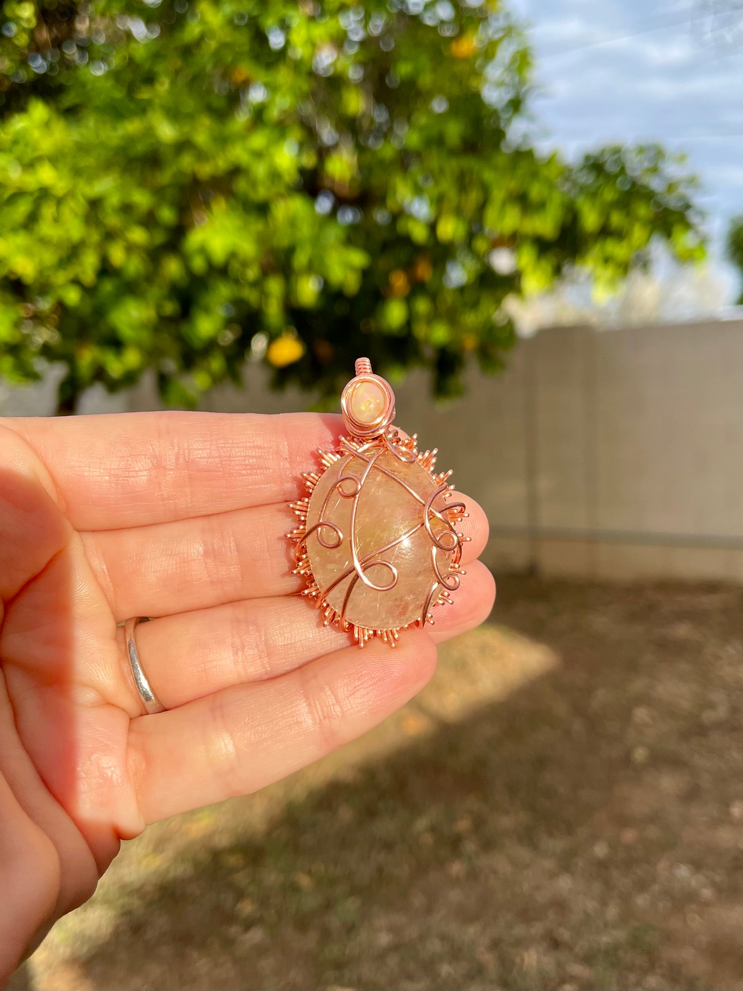 Ritulated Quartz Sunburst Pendant